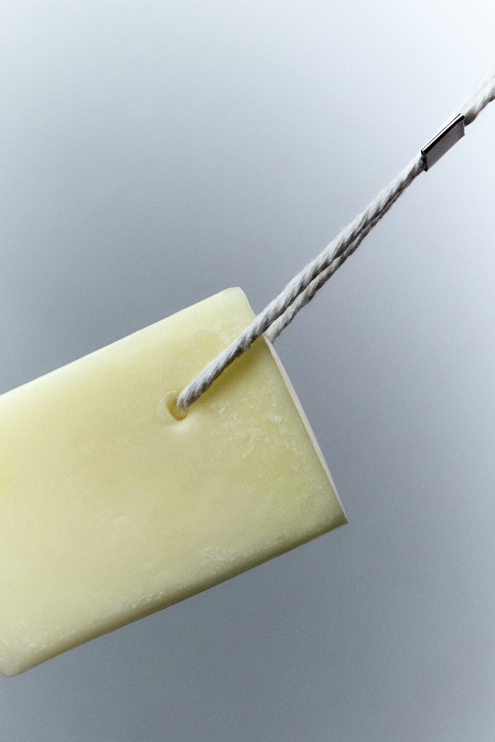 Close up of scented cube wax melt showcasing rope feature 